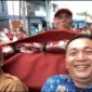 Ketua PGRI Kecamatan Palabuhanratu, Bayu Risnandar (kiri), Kepala Dinas Pendidikan Kabupaten Sukabumi, Deden Sumpena (kanan).